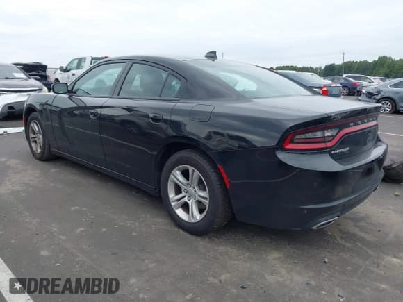 ✅ 2023 Dodge Charger SXT • VIN: 2C3CDXBG5PH579520 • Lot: 43245472. Listed on IAAI with 59,873 mi. Free auction sales archive from the USA and detailed vehicle history report at DreamBid. Image 3.