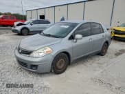 ✅ 2010 Nissan Versa S • VIN: 3N1BC1AP6AL371933 • Lot: 95093135. Listed on Copart with 164,468 mi. Free auction sales archive from the USA and detailed vehicle history report at DreamBid. Image 1.