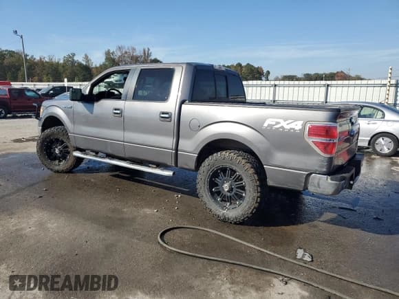 ✅ 2013 Ford F-150 FX4 • VIN: 1FTFW1EF3DFC25382 • Lot: 91223005. Listed on Copart with 203,544 mi. Free auction sales archive from the USA and detailed vehicle history report at DreamBid. Image 2.
