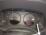 ✅ 2015 Jeep Patriot Latitude • VIN: 1C4NJRFB9FD382465 • Lot: 43889253. Listed on IAAI with 127,732 mi. Free auction sales archive from the USA and detailed vehicle history report at DreamBid. Image 7.