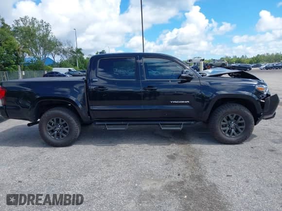 2022 Toyota Tacoma SR5 with VIN 3TMAZ5CN4NM164094, listed as a IAAI auction lot 43409274 with 38,585 mi miles and . Bid and sale history available at DreamBid. Image 13.