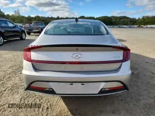 2021 Hyundai Sonata Blue с VIN KMHL24JJ6MA030492, выставлен на аукционе Copart как лот 84024805 с пробегом 27 940 миль миль и Списание • Salvage title. История ставок и продаж доступна на DreamBid. Изображение 6.