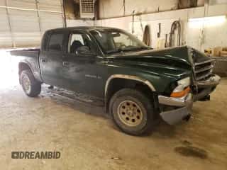 2001 Dodge Dakota Sport with VIN 1B7HG2AZ51S306530, listed as a Copart auction lot 60946554 with Not provided miles and Clean title. Bid and sale history available at DreamBid. Image 4.
