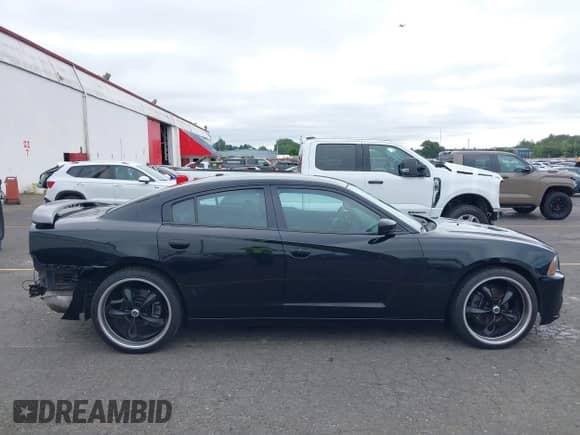 2012 Dodge Charger SXT z VIN 2C3CDXHG6CH248267, wystawiony jako IAAI lot #42836834 z przebiegiem 130 898 mil mil oraz . Historia ofert i sprzedaży dostępna na DreamBid. Obrazek 14.