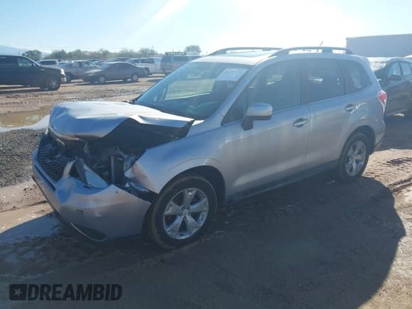 ✅ 2014 Subaru Forester Limited • VIN: JF2SJAHC2EH461978 • Lot: 43779138. Listed on IAAI with 162,384 mi. Free auction sales archive from the USA and detailed vehicle history report at DreamBid. Image 2.