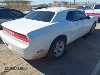 ✅ 2014 Dodge Challenger SXT • VIN: 2C3CDYAG8EH256258 • Lot: 40918933. Wystawiony na IAAI z przebiegiem 125 326 mil. Bezpłatny archiwum sprzedaży aukcyjnych z USA i szczegółowy raport historii pojazdu na DreamBid. Zdjęcie 4.
