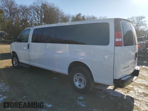 ✅ 2023 Chevrolet Express Passenger LS • VIN: 1GAZGNFP7P1234198 • Lot: 85733764. Listed on Copart with 18,464 mi. Free auction sales archive from the USA and detailed vehicle history report at DreamBid. Image 2.
