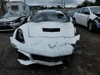 2016 Chevrolet Corvette 1LT с VIN 1G1YB2D76G5122190, выставлен на аукционе Copart как лот 66334334 с пробегом 32 918 миль миль и Списание • Salvage title. История ставок и продаж доступна на DreamBid. Изображение 5.