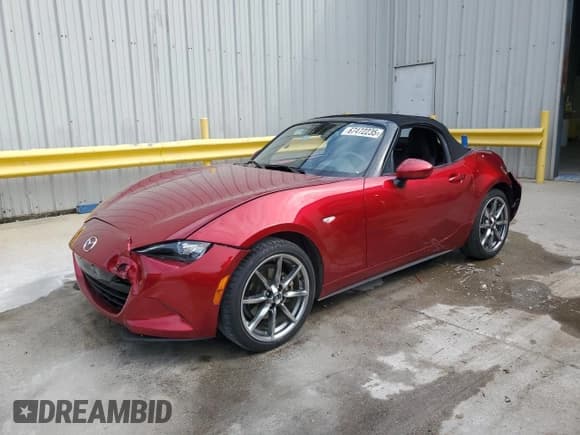 ✅ 2023 Mazda MX-5 Miata Grand Touring • VIN: JM1NDAD77P0554881 • Лот: 67472235. Опубликован ранее на Copart с пробегом 36 146 миль. Бесплатный доступ к архиву аукционных продаж из США и подробный отчёт об истории автомобиля на DreamBid. Изображение 1.