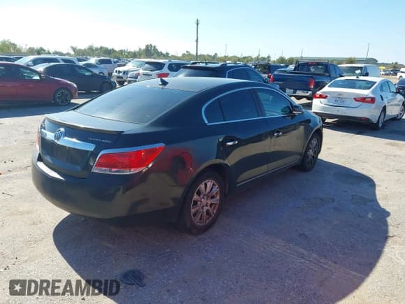 ✅ 2013 Buick LaCrosse Leather • VIN: 1G4GC5GR6DF248811 • Lot: 43753519. Listed on IAAI with 158,125 mi. Free auction sales archive from the USA and detailed vehicle history report at DreamBid. Image 4.