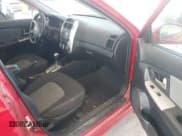 ✅ 2009 Kia Spectra Spectra5 • VIN: KNAFE241595023877 • Lot: 42583449. Listed on IAAI with 160,843 mi. Free auction sales archive from the USA and detailed vehicle history report at DreamBid. Image 5.