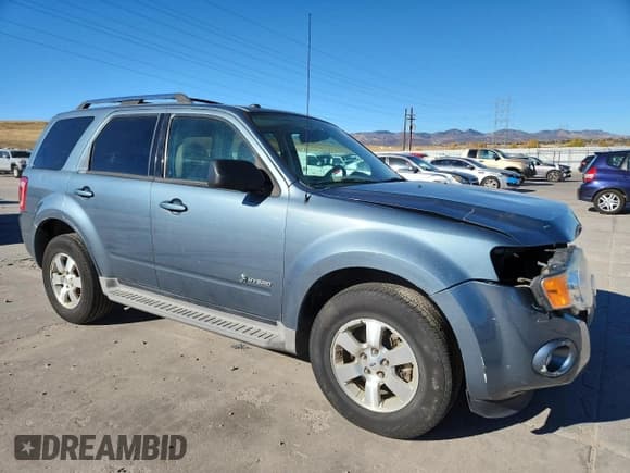 ✅ 2010 Ford Escape Hybrid • VIN: 1FMCU5K38AKB91125 • Lot: 90573495. Wystawiony na Copart z przebiegiem 150 609 mil. Bezpłatny archiwum sprzedaży aukcyjnych z USA i szczegółowy raport historii pojazdu na DreamBid. Zdjęcie 4.