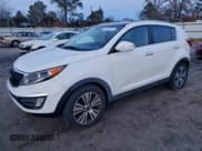 ✅ 2014 Kia Sportage EX • VIN: KNDPC3AC8E7576577 • Lot: 94524075. Listed on Copart with 133,497 mi. Free auction sales archive from the USA and detailed vehicle history report at DreamBid. Image 1.