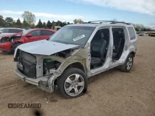 ✅ 2013 Honda Pilot EX-L • VIN: 5FNYF4H51DB057338 • Lot: 85956925. Listed on Copart with 127,562 mi. Free auction sales archive from the USA and detailed vehicle history report at DreamBid. Image 1.