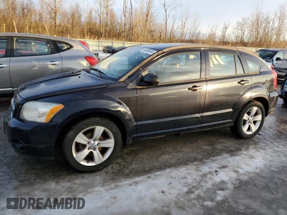 ✅ 2010 Dodge Caliber Mainstreet • VIN: 1B3CB3HAXAD648284 • Лот: 84856604. Опубликован ранее на Copart с пробегом 84 032 миль. Бесплатный доступ к архиву аукционных продаж из США и подробный отчёт об истории автомобиля на DreamBid. Изображение 1.
