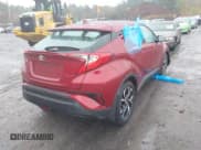 ✅ 2018 Toyota C-HR XLE • VIN: NMTKHMBX3JR019156 • Lot: 43415158. Listed on IAAI with 28,348 mi. Free auction sales archive from the USA and detailed vehicle history report at DreamBid. Image 4.