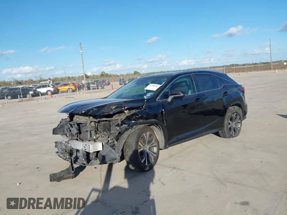 ✅ 2017 Lexus RX 350 • VIN: 2T2ZZMCA9HC034587 • Lot: 43708281. Listed on IAAI with 154,215 mi. Free auction sales archive from the USA and detailed vehicle history report at DreamBid. Image 2.