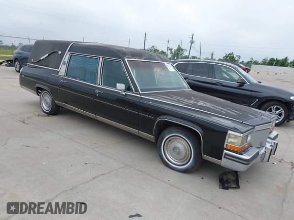 ✅ 1989 Cadillac Brougham • VIN: 1G6DW51Y6KR730868 • Лот: 42315431. Опубликован ранее на IAAI с пробегом 90 027 миль. Бесплатный доступ к архиву аукционных продаж из США и подробный отчёт об истории автомобиля на DreamBid. Изображение 1.