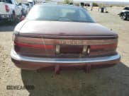 ✅ 1988 Buick Reatta • VIN: 1G4EC11C5JB903452 • Lot: 52290395. Listed on Copart with 80,709 mi. Free auction sales archive from the USA and detailed vehicle history report at DreamBid. Image 6.