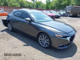 ✅ 2023 Mazda 3 S Carbon Edition • VIN: 3MZBPACM6PM354313 • Lot: 42401096. Listed on IAAI with 33,076 mi. Free auction sales archive from the USA and detailed vehicle history report at DreamBid. Image 1.
