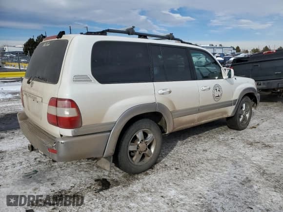 ✅ 2006 Toyota Land Cruiser • VIN: JTEHT05JX62099298 • Lot: 88842125. Listed on Copart with 233,900 mi. Free auction sales archive from the USA and detailed vehicle history report at DreamBid. Image 3.
