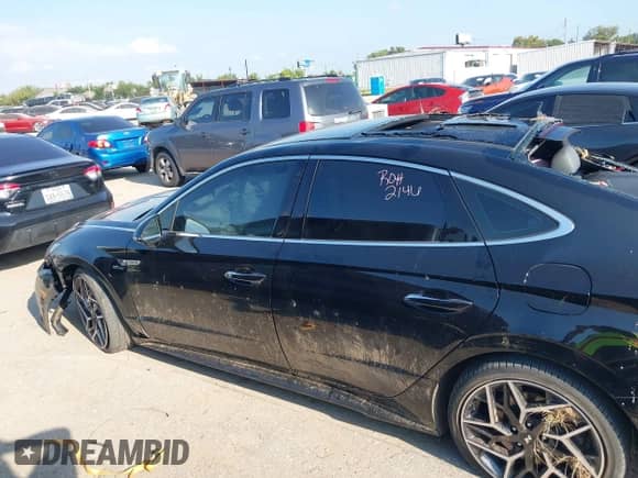 2023 Hyundai Sonata N Line with VIN KMHL14JC9PA326874, listed as a IAAI auction lot 43195407 with 42,210 mi miles and . Bid and sale history available at DreamBid. Image 14.