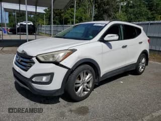 ✅ 2013 Hyundai Santa Fe Sport • VIN: 5XYZU3LA0DG031170 • Lot: 60977745. Listed on Copart with 113,002 mi. Free auction sales archive from the USA and detailed vehicle history report at DreamBid. Image 1.
