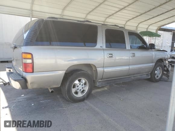 ✅ 2003 Chevrolet Suburban LS • VIN: 1GNEC16T33J262864 • Лот: 61648255. Опубликован ранее на Copart с пробегом 298 652 миль. Бесплатный доступ к архиву аукционных продаж из США и подробный отчёт об истории автомобиля на DreamBid. Изображение 3.