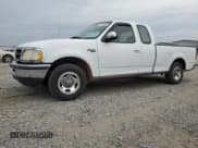 ✅ 1997 Ford F-150 • VIN: 2FTDX1765VCA44346 • Lot: 82113845. Listed on Copart with 218,765 mi. Free auction sales archive from the USA and detailed vehicle history report at DreamBid. Image 1.