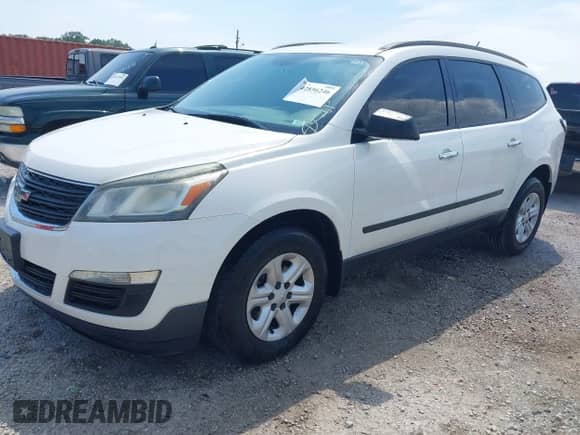 2013 Chevrolet Traverse LS with VIN 1GNKRFED1DJ221661, listed as a IAAI auction lot 42856246 with 210,438 mi miles and . Bid and sale history available at DreamBid. Image 2.