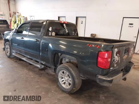 2018 Chevrolet Silverado 1500 LT z VIN 3GCUKREC0JG519095, wystawiony jako IAAI lot #43271594 z przebiegiem 108 548 mil mil oraz . Historia ofert i sprzedaży dostępna na DreamBid. Obrazek 3.