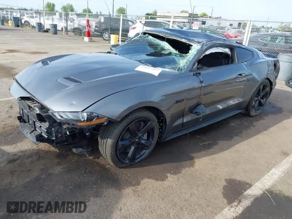 ✅ 2022 Ford Mustang GT • VIN: 1FA6P8CF2N5131421 • Lot: 42047492. Listed on IAAI with 21,376 mi. Free auction sales archive from the USA and detailed vehicle history report at DreamBid. Image 2.