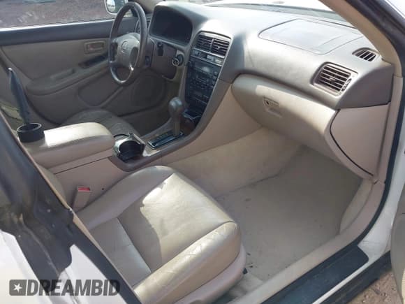 ✅ 1998 Lexus ES 300 • VIN: JT8BF28G2W0131104 • Lot: 42680242. Listed on IAAI with 243,762 mi. Free auction sales archive from the USA and detailed vehicle history report at DreamBid. Image 5.