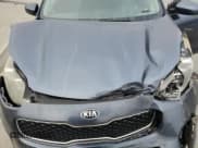 ✅ 2018 Kia Sportage LX • VIN: KNDPM3AC4J7424156 • Lot: 82735745. Listed on Copart with 125,677 mi. Free auction sales archive from the USA and detailed vehicle history report at DreamBid. Image 12.