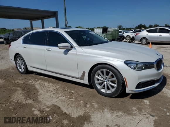 ✅ 2017 BMW 7 Series 740i • VIN: WBA7E2C51HG739932 • Lot: 57101815. Listed on Copart with 58,499 mi. Free auction sales archive from the USA and detailed vehicle history report at DreamBid. Image 4.