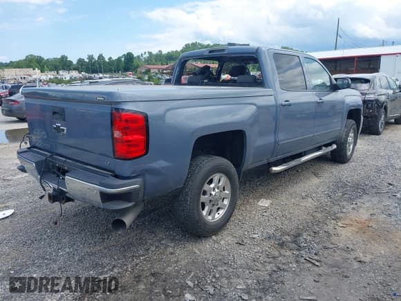 ✅ 2015 Chevrolet Silverado 2500HD LT • VIN: 1GC1CVE85FF587440 • Lot: 42545643. Listed on IAAI with Not provided. Free auction sales archive from the USA and detailed vehicle history report at DreamBid. Image 4.