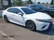 2020 Toyota Camry Hybrid SE z VIN 4T1G31AK0LU541702, wystawiony jako IAAI lot #42918554 z przebiegiem 118 679 mil mil oraz . Historia ofert i sprzedaży dostępna na DreamBid. Obrazek 1.