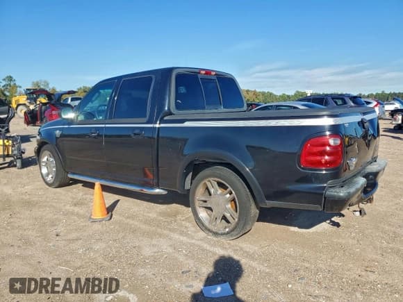 ✅ 2003 Ford F-150 Harley-Davidson • VIN: 1FTRW07343KD83293 • Лот: 94547995. Опубликован ранее на Copart с пробегом 176 233 миль. Бесплатный доступ к архиву аукционных продаж из США и подробный отчёт об истории автомобиля на DreamBid. Изображение 2.