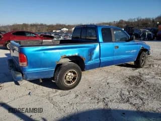 ✅ 1999 Dodge Dakota SLT • VIN: 1B7GL22X5XS321879 • Lot: 84015834. Wystawiony na Copart z przebiegiem 210 252 mil. Bezpłatny archiwum sprzedaży aukcyjnych z USA i szczegółowy raport historii pojazdu na DreamBid. Zdjęcie 3.