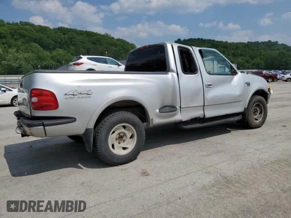 ✅ 1998 Ford F-150 XL • VIN: 2FTRX08L1WCA81688 • Lot: 58185525. Listed on Copart with 185,062 mi. Free auction sales archive from the USA and detailed vehicle history report at DreamBid. Image 3.