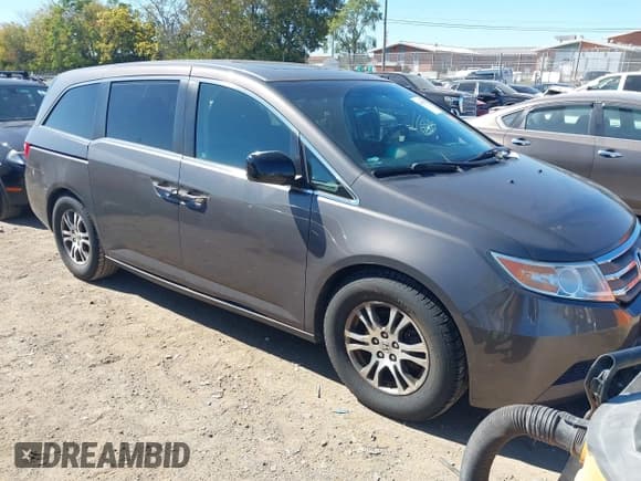 ✅ 2011 Honda Odyssey EX-L • VIN: 5FNRL5H60BB059011 • Lot: 43460535. Listed on IAAI with 190,023 mi. Free auction sales archive from the USA and detailed vehicle history report at DreamBid. Image 1.