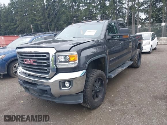 ✅ 2016 GMC Sierra 2500HD SLE • VIN: 1GT12SE80GF133132 • Lot: 41908794. Listed on IAAI with 197,141 mi. Free auction sales archive from the USA and detailed vehicle history report at DreamBid. Image 17.