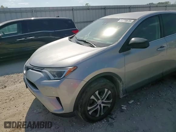 ✅ 2018 Toyota RAV4 LE • VIN: 2T3BFREV0JW709704 • Lot: 84770675. Listed on Copart with 137,937 mi. Free auction sales archive from the USA and detailed vehicle history report at DreamBid. Image 14.