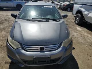 ✅ 2011 Honda Insight • VIN: JHMZE2H35BS008815 • Лот: 68100194. Опубликован ранее на Copart с пробегом 134 775 миль. Бесплатный доступ к архиву аукционных продаж из США и подробный отчёт об истории автомобиля на DreamBid. Изображение 5.