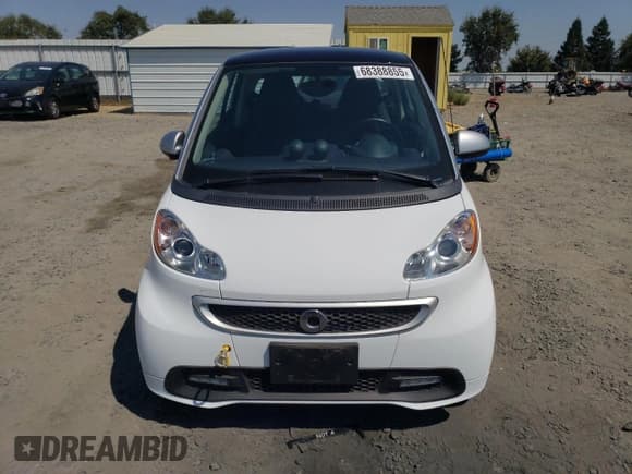 ✅ 2013 Smart fortwo Passion • VIN: WMEEJ9AA6DK717318 • Lot: 68388855. Listed on Copart with Not provided. Free auction sales archive from the USA and detailed vehicle history report at DreamBid. Image 5.
