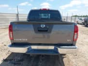 ✅ 2021 Nissan Frontier SV • VIN: 1N6ED0EA0MN710260 • Lot: 42292937. Listed on IAAI with 63,573 mi. Free auction sales archive from the USA and detailed vehicle history report at DreamBid. Image 16.