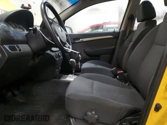 2011 Chevrolet Aveo 1LT z VIN KL1TD5DE5BB185603, wystawiony jako Copart lot #83857664 z przebiegiem 95 728 mil mil oraz Czysty tytuł • Clean title. Historia ofert i sprzedaży dostępna na DreamBid. Obrazek 7.