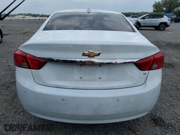 ✅ 2014 Chevrolet Impala LT • VIN: 1G1115SL0EU142492 • Лот: 66835834. Опубликован ранее на Copart с пробегом 132 303 миль. Бесплатный доступ к архиву аукционных продаж из США и подробный отчёт об истории автомобиля на DreamBid. Изображение 6.