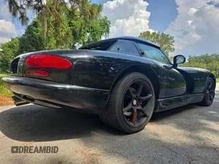 ✅ 2000 Dodge Viper RT/10 • VIN: 1B3ER65E9YV604682 • Lot: 60898085. Listed on Copart with 56,029 mi. Free auction sales archive from the USA and detailed vehicle history report at DreamBid. Image 4.