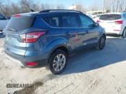 ✅ 2018 Ford Escape SE • VIN: 1FMCU9GD2JUA21484 • Lot: 41285765. Wystawiony na IAAI z przebiegiem 102 523 mil. Bezpłatny archiwum sprzedaży aukcyjnych z USA i szczegółowy raport historii pojazdu na DreamBid. Zdjęcie 4.